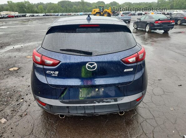JM1DKFB70H0145995 2017 MAZDA CX-3 Blue Widok z tyłu