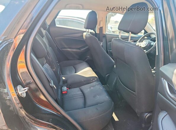 JM1DKFB70K1423280 2019 MAZDA CX-3 Black Widok wnętrza z tyłu