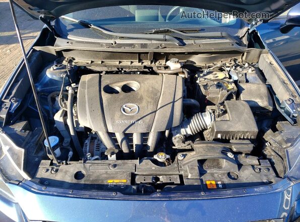 JM1DKFB72M1505966 2021 MAZDA CX-3 Blue Սալոնի հետևի տեսք