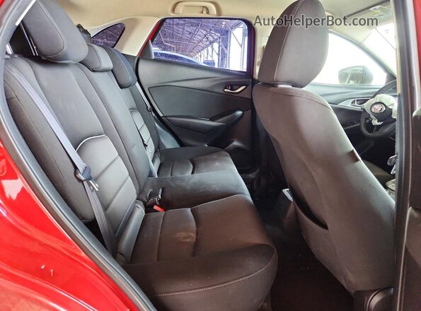 JM1DKFB75G0133971 2016 MAZDA CX-3 Red Rear interior view