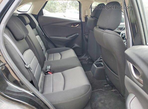 JM1DKFB78G0129512 2016 MAZDA CX-3 Black Widok tylnych siedzeń