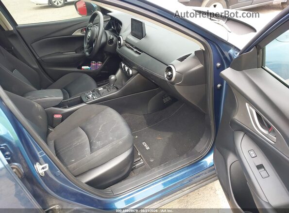 JM1DKFB78M1514056 2021 MAZDA CX-3 Blue Widok wnętrza z przodu