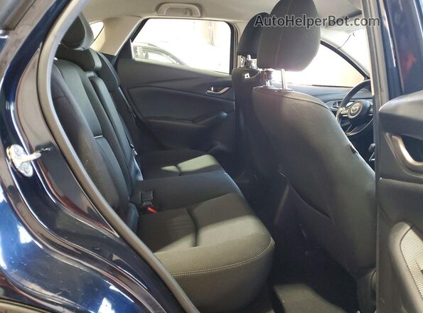 JM1DKFB79L1469756 2020 MAZDA CX-3 Blue Widok wnętrza z tyłu