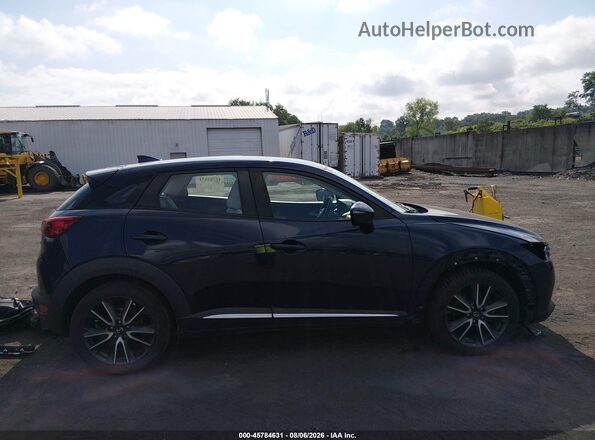JM1DKFD71H0166657 2017 MAZDA CX-3 Blue Vista interior trasera