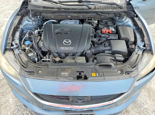 JM1GJ1U58G1410167 2016 MAZDA 6 Blue Vista interior trasera