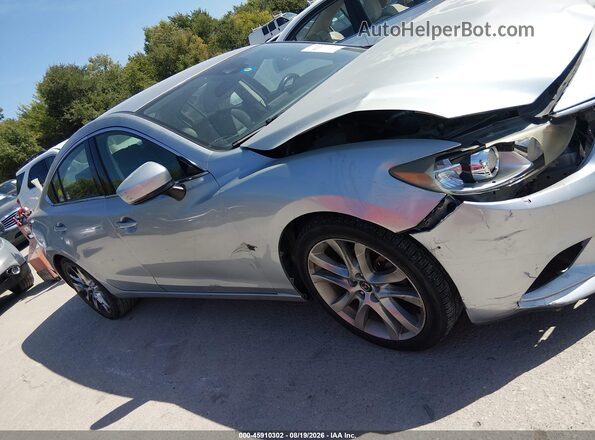 JM1GL1V54H1107445 2017 MAZDA 6 Light Blue Vista interior trasera