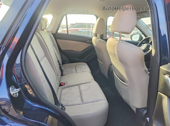 JM3KE2BY0G0867022 2016 MAZDA CX-5 Blue Vista de los asientos traseros