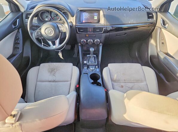 JM3KE2BY0G0867022 2016 MAZDA CX-5 Blue Vista del salpicadero