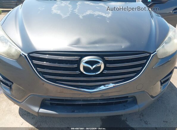 JM3KE2BY7G0763675 2016 MAZDA CX-5 Gray Widok z przodu