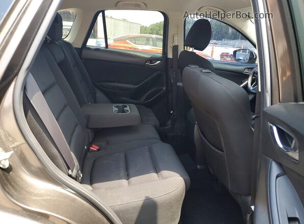 JM3KE2CY0G0908490 2016 MAZDA CX-5 Charcoal Rear interior view