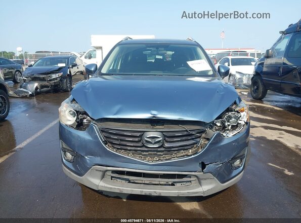 JM3KE2CY6G0628315 2016 MAZDA CX-5 Blue Instrument cluster view