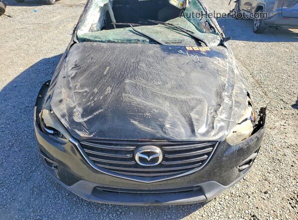 JM3KE2CY8G0616005 2016 MAZDA CX-5 Black Vista interior trasera