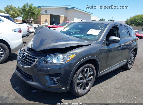 JM3KE2DY3G0908711 2016 MAZDA CX-5 Gray Vista tres cuartos delantera izquierda