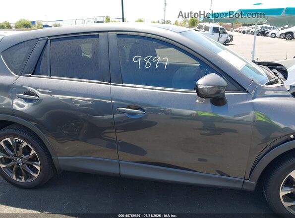JM3KE2DY3G0908711 2016 MAZDA CX-5 Gray Vista interior trasera