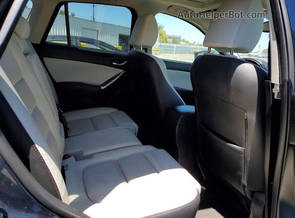 JM3KE2DY7G0611165 2016 MAZDA CX-5 Blue Vista de los asientos traseros
