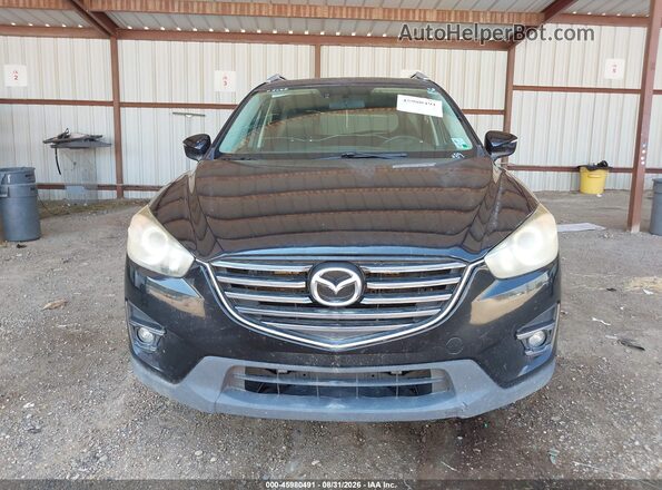 JM3KE2DY7G0728972 2016 MAZDA CX-5 Black Vista del cuadro de instrumentos
