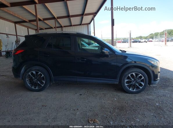 JM3KE2DY7G0728972 2016 MAZDA CX-5 Black Vista interior trasera