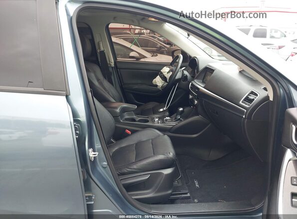 JM3KE2DY8G0818213 2016 MAZDA CX-5 Blue Widok wnętrza z przodu