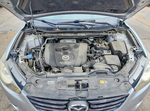 JM3KE4BY4G0613051 2016 MAZDA CX-5 Gray Widok wnętrza z tyłu