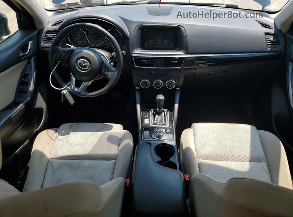 JM3KE4BY4G0869612 2016 MAZDA CX-5 Blue Առջևի վահանակի տեսք