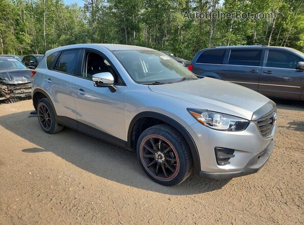 JM3KE4BYXG0801072 2016 MAZDA CX-5 Серебряный Передняя правая четверть