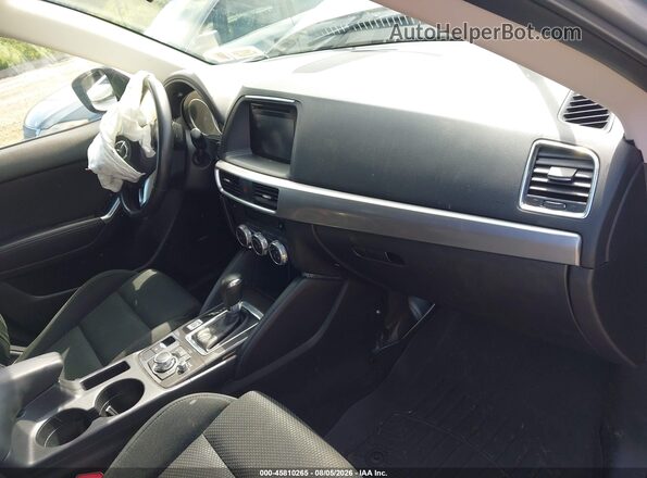 JM3KE4CY3G0757432 2016 MAZDA CX-5 Silver წინა სალონის ხედი