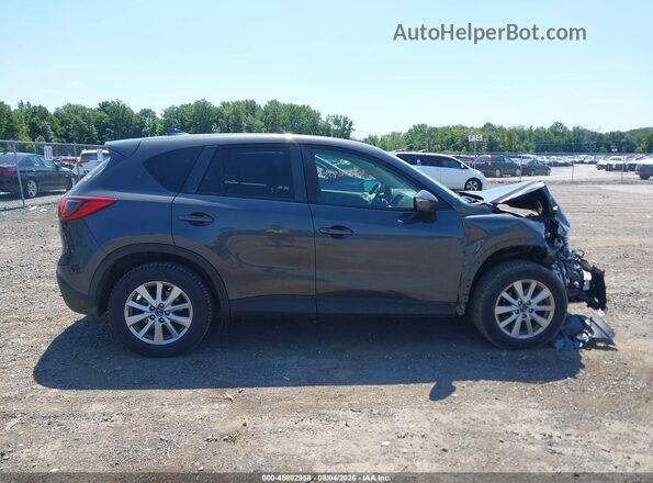 JM3KE4CY7G0601605 2016 MAZDA CX-5 Gray Widok wnętrza z tyłu