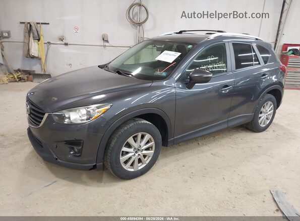 JM3KE4CYXG0795451 2016 MAZDA CX-5 Gray Առջևի ձախ երեք քառորդ տեսարան