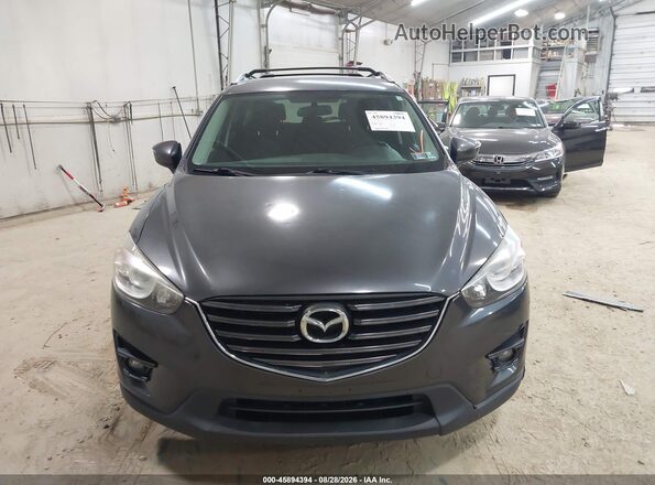 JM3KE4CYXG0795451 2016 MAZDA CX-5 Gray Սարքավորումների վահանակի տեսք