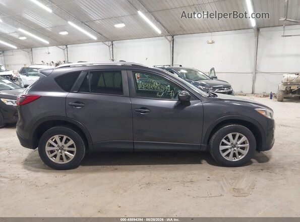 JM3KE4CYXG0795451 2016 MAZDA CX-5 Gray Սալոնի հետևի տեսք