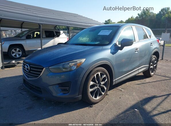 JM3KE4DY0G0760464 2016 MAZDA CX-5 Gray წინა მარცხენა ხედი სამი მეოთხედიდან