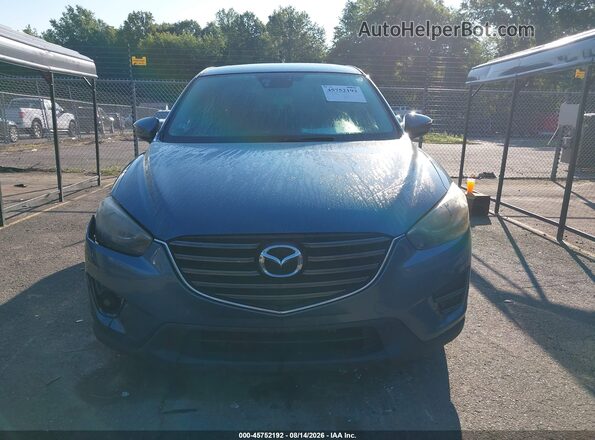 JM3KE4DY0G0760464 2016 MAZDA CX-5 Gray ხელსაწყოთა პანელის ხედი