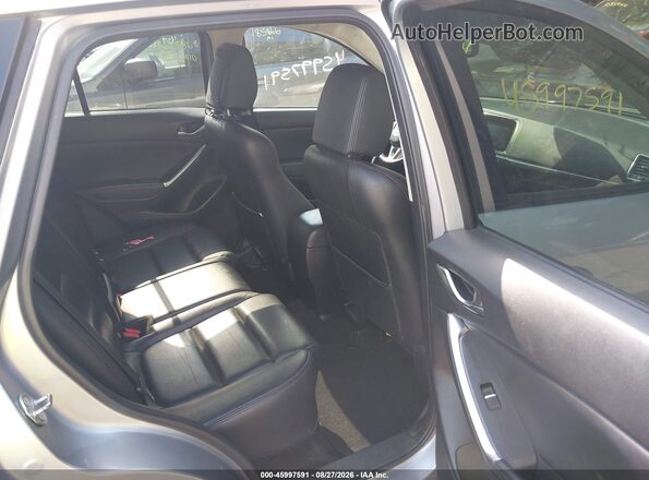 JM3KE4DY3G0710786 2016 MAZDA CX-5 Silver VIN კოდის სტიკერის ხედი