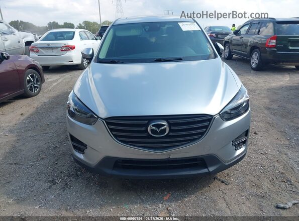 JM3KE4DY3G0710786 2016 MAZDA CX-5 Silver ხელსაწყოთა პანელის ხედი