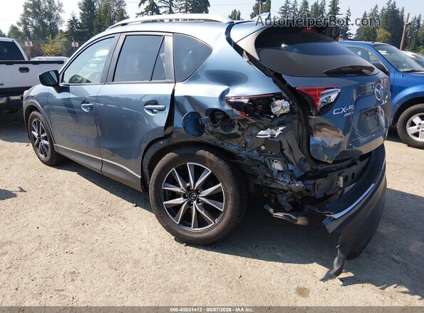 JM3KE4DY8G0762334 2016 MAZDA CX-5 Blue Trasero izquierdo