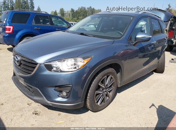 JM3KE4DY8G0762334 2016 MAZDA CX-5 Blue Vista tres cuartos delantera izquierda