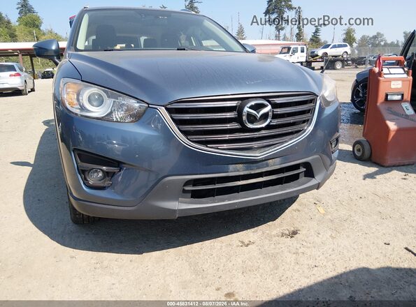 JM3KE4DY8G0762334 2016 MAZDA CX-5 Blue Vista del cuadro de instrumentos