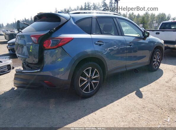 JM3KE4DY8G0762334 2016 MAZDA CX-5 Blue Trasero derecho