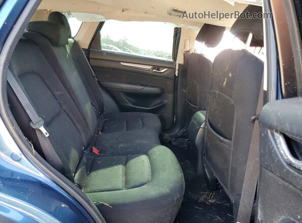 JM3KFABL5H0210214 2017 MAZDA CX-5 Blue Widok wnętrza z tyłu