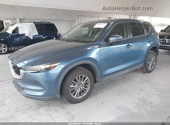 JM3KFACL6H0142598 2017 MAZDA CX-5 Blue Առջևի ձախ երեք քառորդ տեսարան