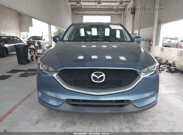 JM3KFACL6H0142598 2017 MAZDA CX-5 Blue Սալոնի հետևի տեսք