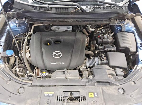 JM3KFACM3M0403334 2021 MAZDA CX-5 Blue Vista interior trasera