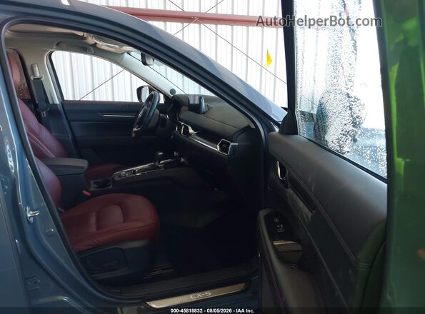 JM3KFACM9M0330518 2021 MAZDA CX-5 Gray Вид салону спереду