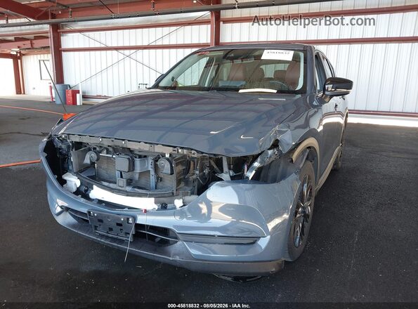 JM3KFACM9M0330518 2021 MAZDA CX-5 Gray Вид спереду