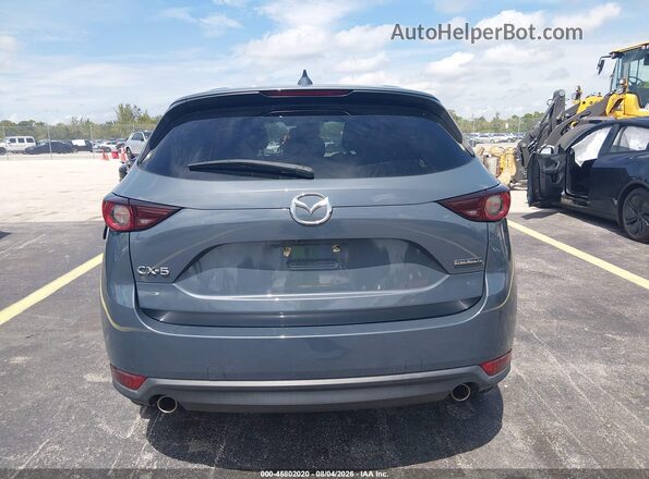 JM3KFACM9M0428917 2021 MAZDA CX-5 Серый 