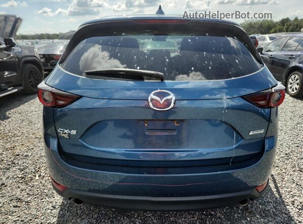 JM3KFACMXK0519885 2019 MAZDA CX-5 Blue უკანა სალონის ხედი