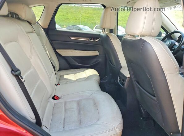JM3KFADL9H0107228 2017 MAZDA CX-5 Red Vista interior trasera