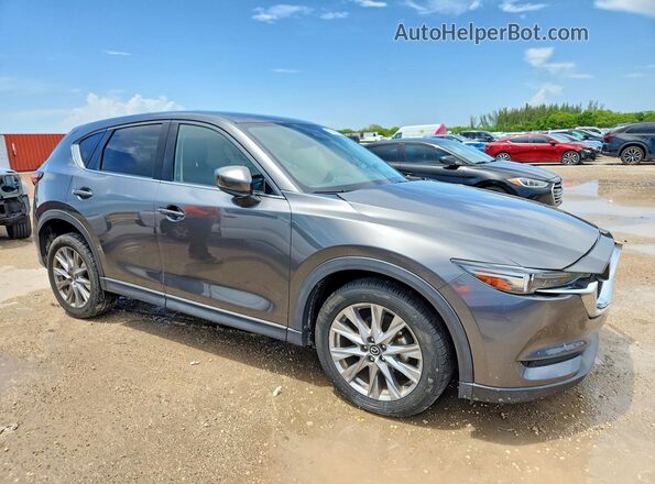 JM3KFADM2M0427428 2021 MAZDA CX-5 Gray Widok wnętrza z przodu
