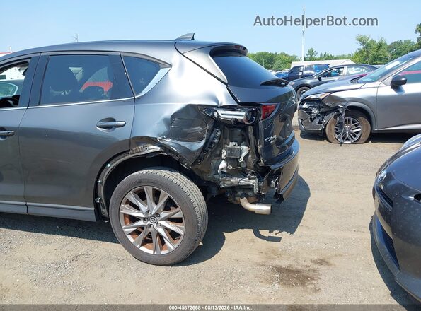 JM3KFBAY0M0304479 2021 MAZDA CX-5 Серый Вид спереди