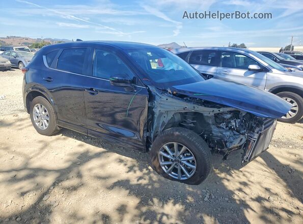 JM3KFBBLXR0473869 2024 MAZDA CX-5 Blue Вид салону спереду
